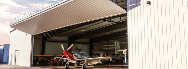 Aircraft hangar bi-fold door