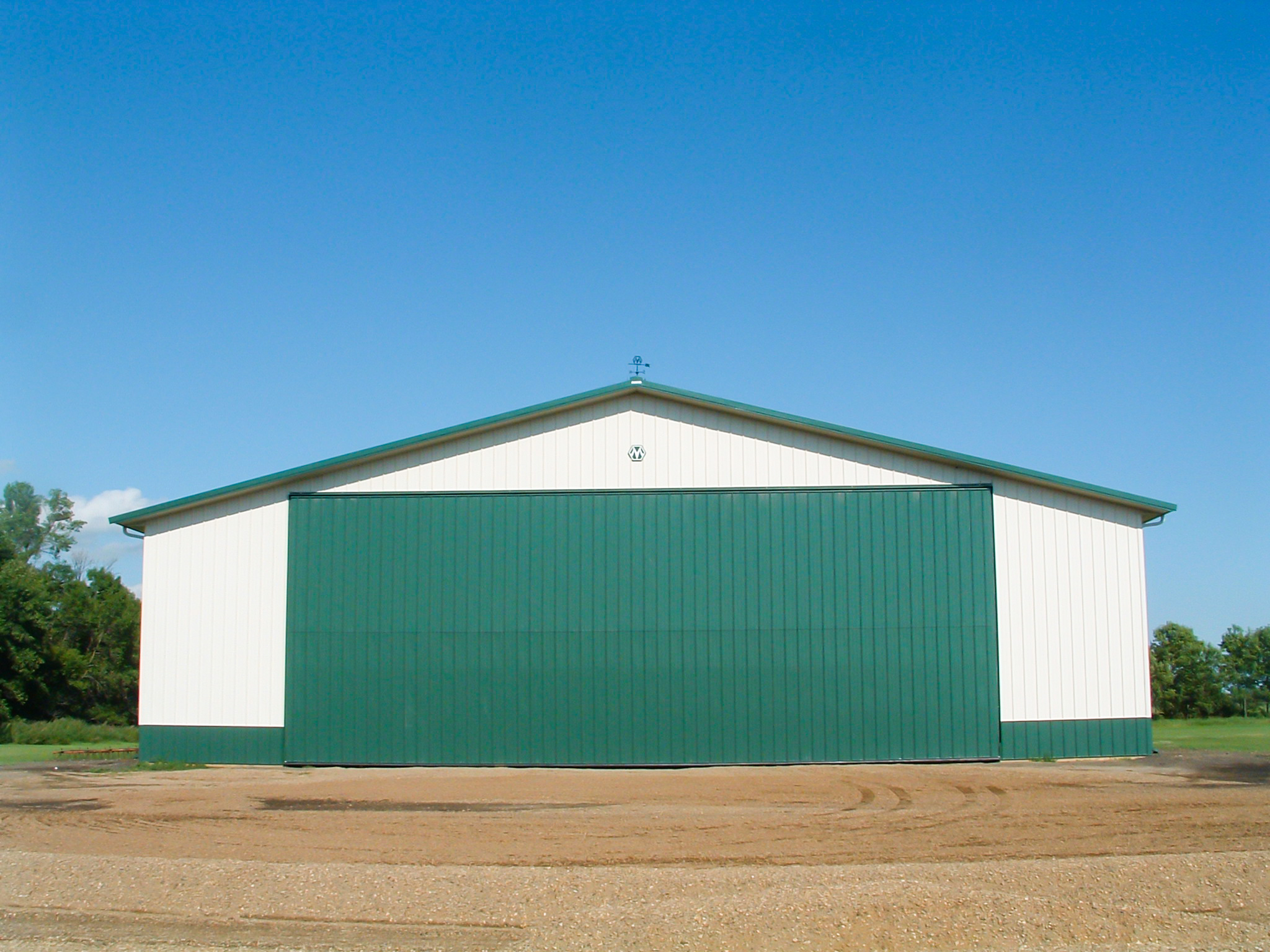 Morton building farm equipment storage bi-fold door
