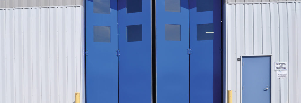 Commercial bi-fold doors on a business in West Fargo, ND Commercial bi-fold doors on a business in West Fargo, ND