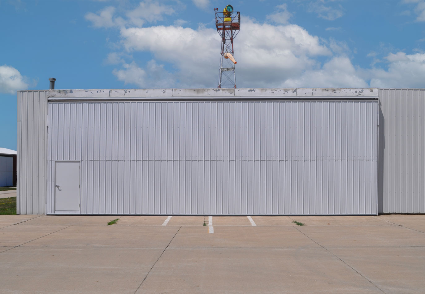Sac City Airport hangar bi-fold door 40ft x 11ft