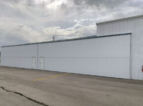 Vinton airport bi-fold hangar-doors