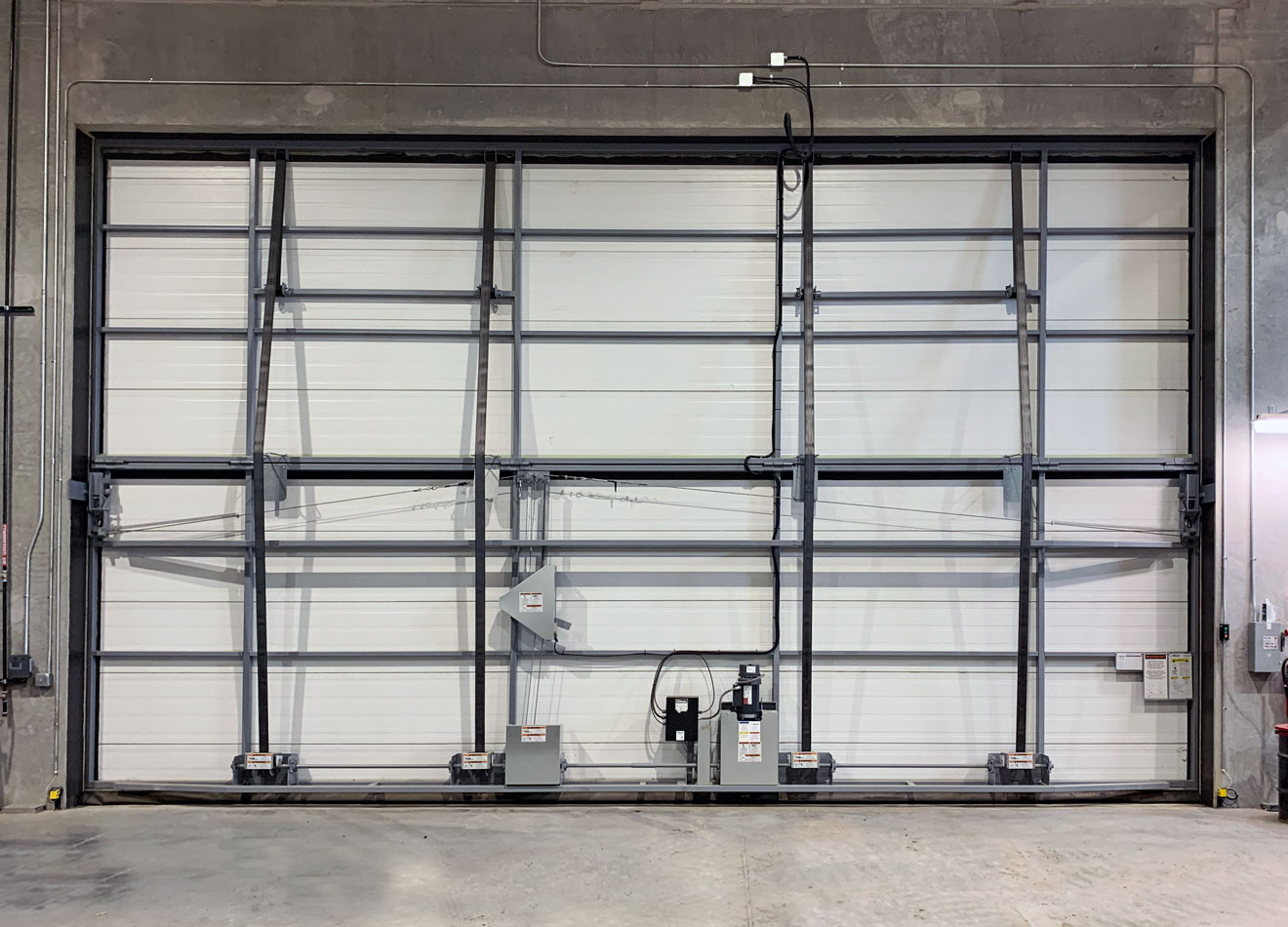 Aviation hangar bi-fold door