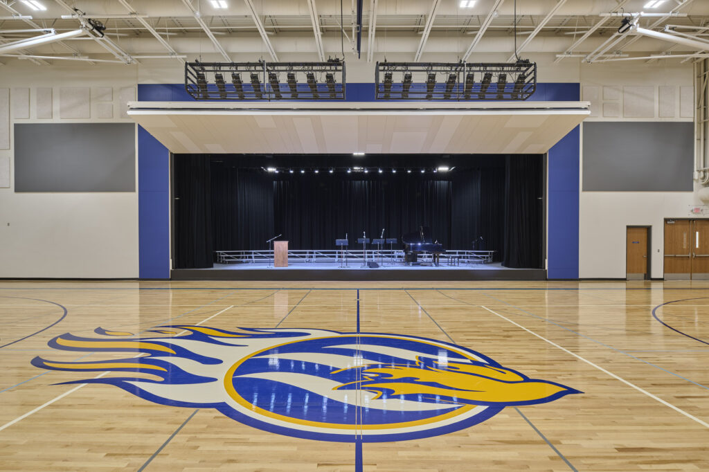 The Blazer Center at Sioux Center Christian School combines a gym and auditorium with a custom bi-fold door, giving staff and students a flexible space that works for sports, performances, and everything in between.