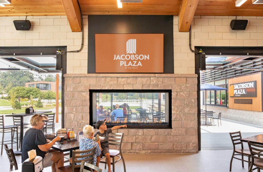 Jacobson Plaza uses custom hydraulic door systems to blur the line between indoors and outdoors in South Dakota's extreme climates.